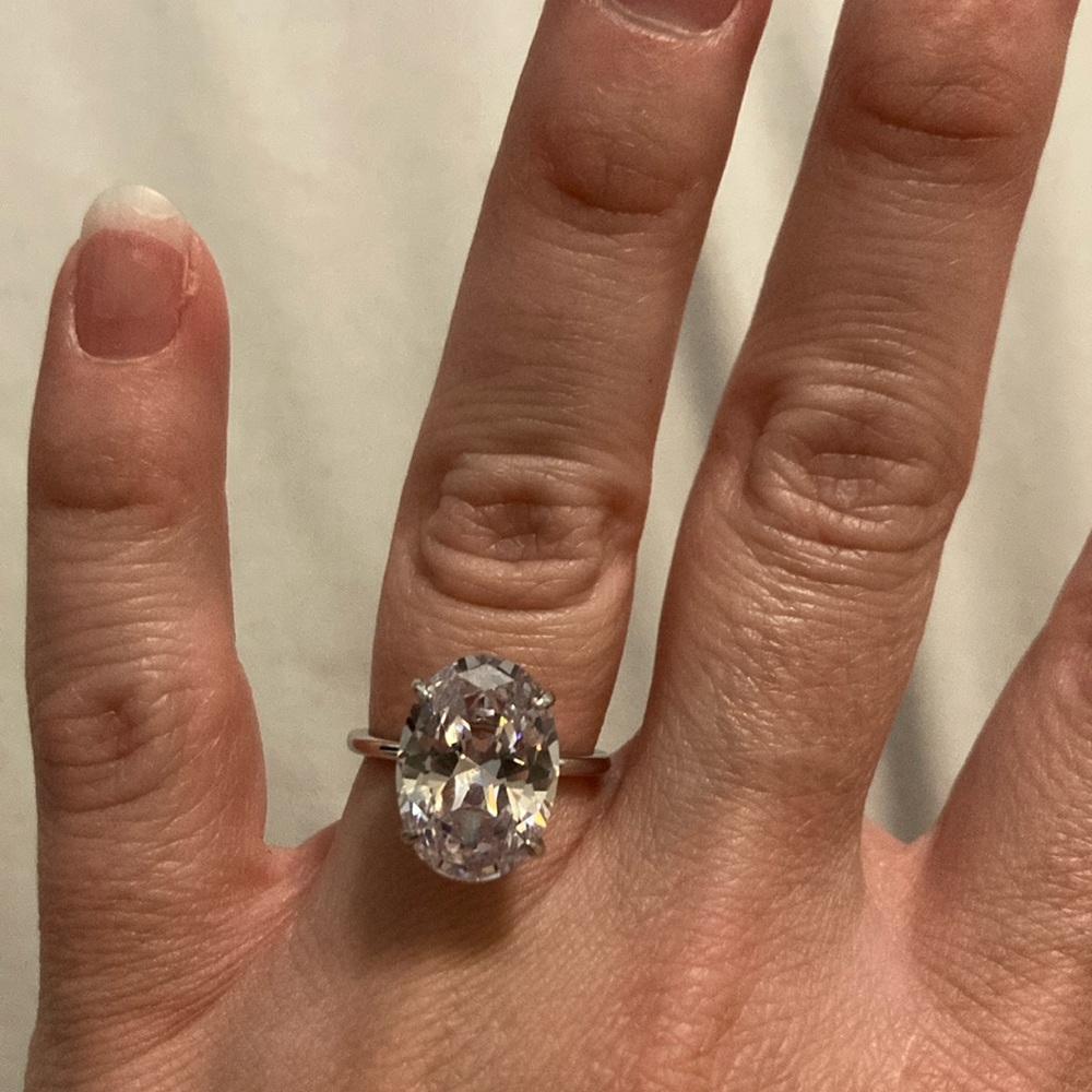 Cubic zirconia 4ct oval size 5 sterling silver ring.